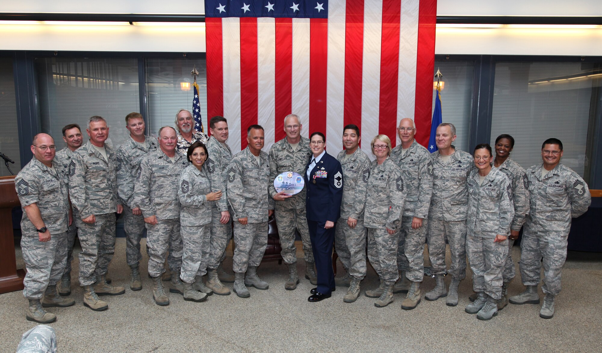 TRAVIS AIR FORCE BASE, Calif. -- Chief Master Sgt. Nancy E. Hinojosa, 749th Aircraft Maintenance Squadron flight superintendent, is honored by members of the 940th Wing, 60th Air Mobility Wing and the 349th Air Mobility Wing in a retirement ceremony at Travis Air Force Base, Calif., May 17, 2015. (U.S. Air Force photo/Lt. Col. Robert Couse-Baker/Released)
