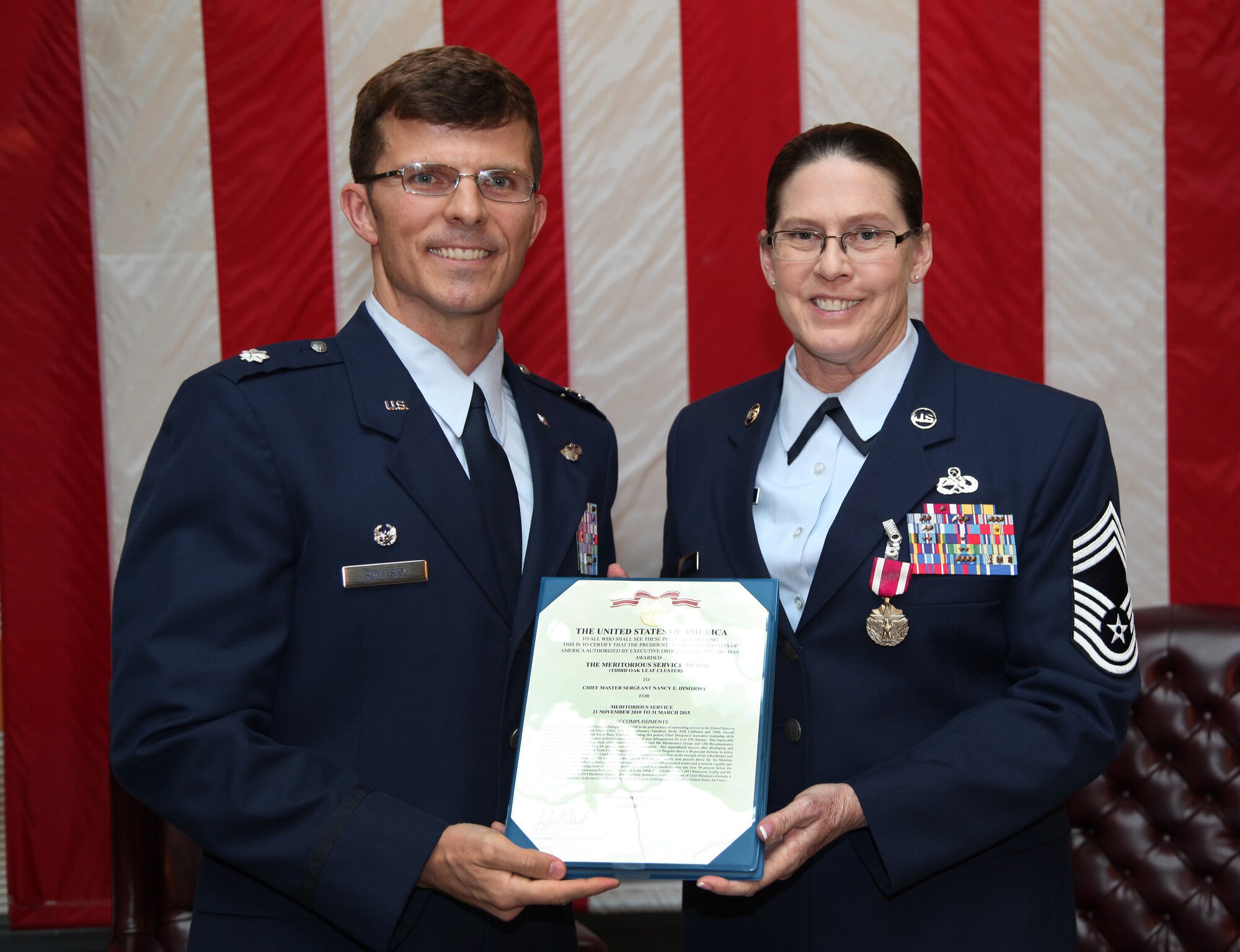 TRAVIS AIR FORCE BASE, Calif. -- Chief Master Sgt. Nancy E. Hinojosa, 749th Aircraft Maintenance Squadron flight superintendent, is honored by members of the 940th Wing, 60th Air Mobility Wing and the 349th Air Mobility Wing in a retirement ceremony at Travis Air Force Base, Calif., May 17, 2015. (U.S. Air Force photo/Lt. Col. Robert Couse-Baker/Released)
