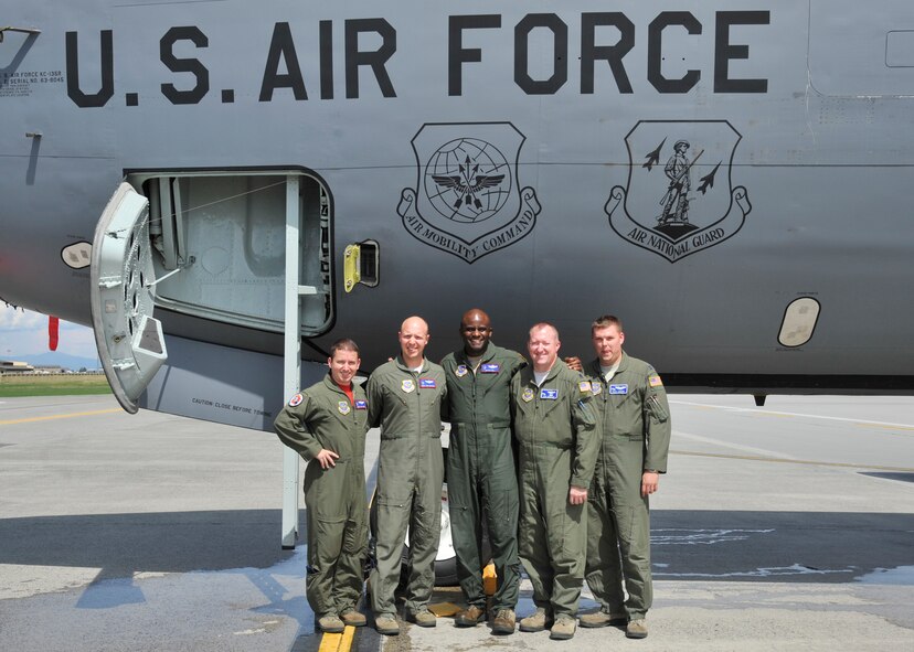Col. Brian Hill, 92nd Air Refueling Wing vice commander, center, poses with the KC-135 Stratotanker crew from his final flight May 29, 2015, at Fairchild Air Force Base, Wash. This was Hill’s last flight to pilot at Fairchild, he accumulated more than 3,000 flight hours both a C-130 and KC-135 pilot.  (U.S. Air Force photo/Airman 1st Class Taylor Bourgeous)