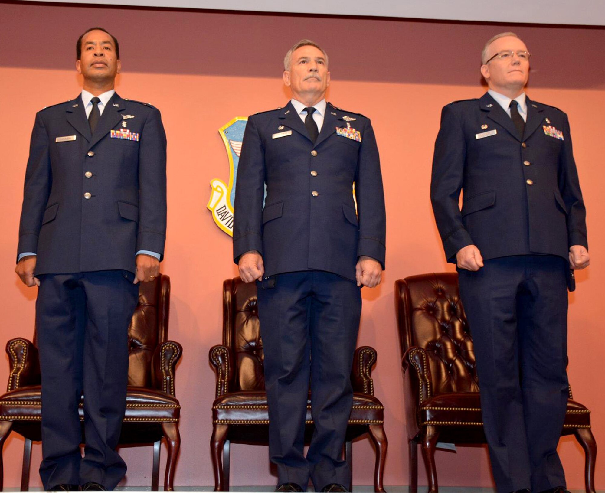 At a 349th Medical Squadron Change of Command ceremony, Col. George Z. Friedman Jr. relinquishes command to the assuming commander, Col. Edward G. Johnson Saturday, May 16, 2015 at the David Grant USAF Medical Center auditorium. (U.S. Air Force photos/Senior Airman Madelyn Brown)
