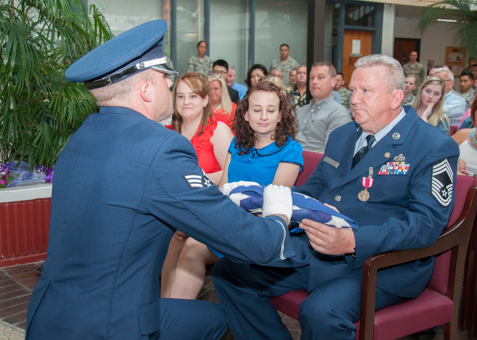 Chief Master Sgt. William Morrissey, 945th Aircraft Maintenance Squadron superintendent, retires during a ceremony May 16, 2015, at Travis Air Force Base, Calif. (U.S. Air Force photo/Master Sgt. Rachel Martinez)
