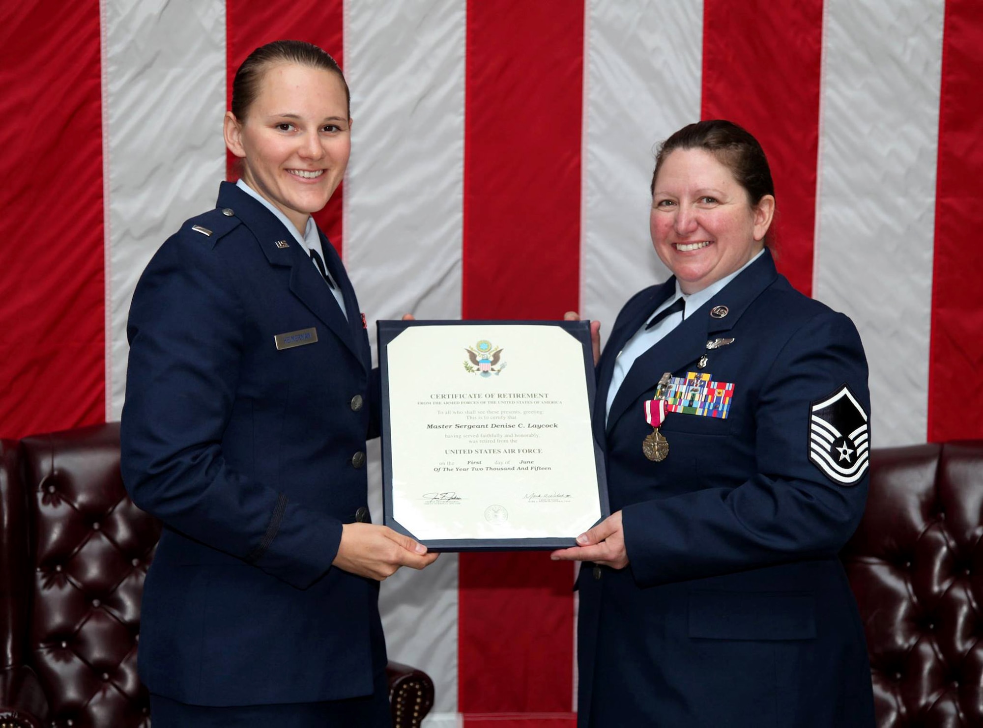 TRAVIS AIR FORCE BASE, Calif. -- Master Sgt. Denise C. Laycock, 349th Maintenance Group career advisor, is honored in a retirement ceremony at Travis AFB, Calif., May 16, 2015. (U.S. Air Force photo/Lt. Col. Robert Couse-Baker/Released
