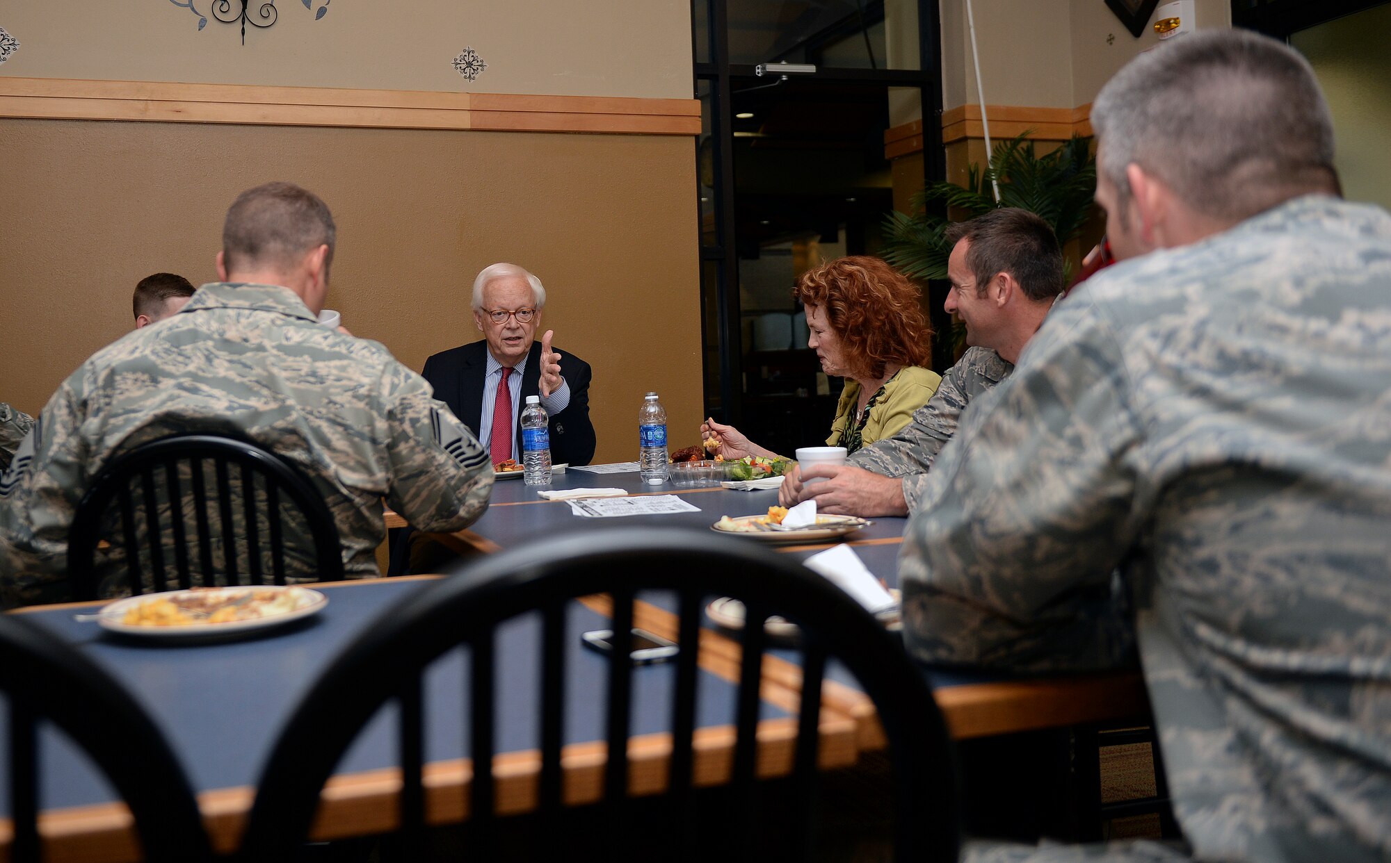 Larry Hatteberg, retired KAKE TV news anchor, has lunch with Airmen after speaking during ‪#‎theSUMof15‬ at the Robert J. Dole Center, May 27, 2015, here. #theSUMof15 is a professional development series that began today and is scheduled to continue Sept. 2. During this time, McConnell will host 15 guest speakers who will discuss the topics of career progression, what has made them successful and what has gotten them to the position they hold. (U.S. Air Force photo by Senior Airman Colby L. Hardin)
