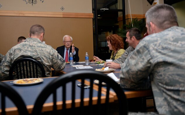 Larry Hatteberg, retired KAKE TV news anchor, has lunch with Airmen after speaking during ‪#‎theSUMof15‬ at the Robert J. Dole Center, May 27, 2015, here. #theSUMof15 is a professional development series that began today and is scheduled to continue Sept. 2. During this time, McConnell will host 15 guest speakers who will discuss the topics of career progression, what has made them successful and what has gotten them to the position they hold. (U.S. Air Force photo by Senior Airman Colby L. Hardin)
