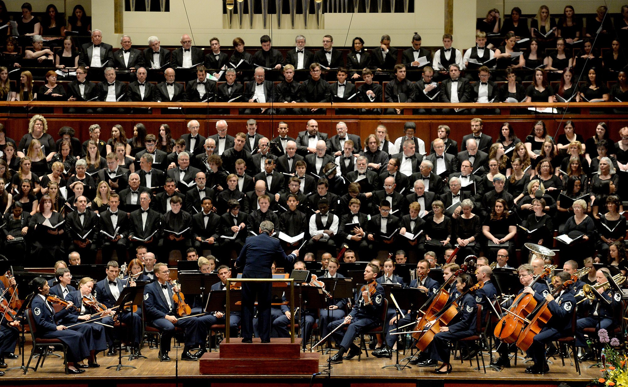 Retired Air Force Col. Arnald D. Gabriel conducts the U.S. Air Force Orchestra, soloists and 10 outstanding choruses from across America. The performance was part of the 2015 Choral Festival presented at the John F. Kennedy Center for the Performing Arts and served as a Memorial Day salute to our nation's heroes. (Scott M. Ash photo/released)
