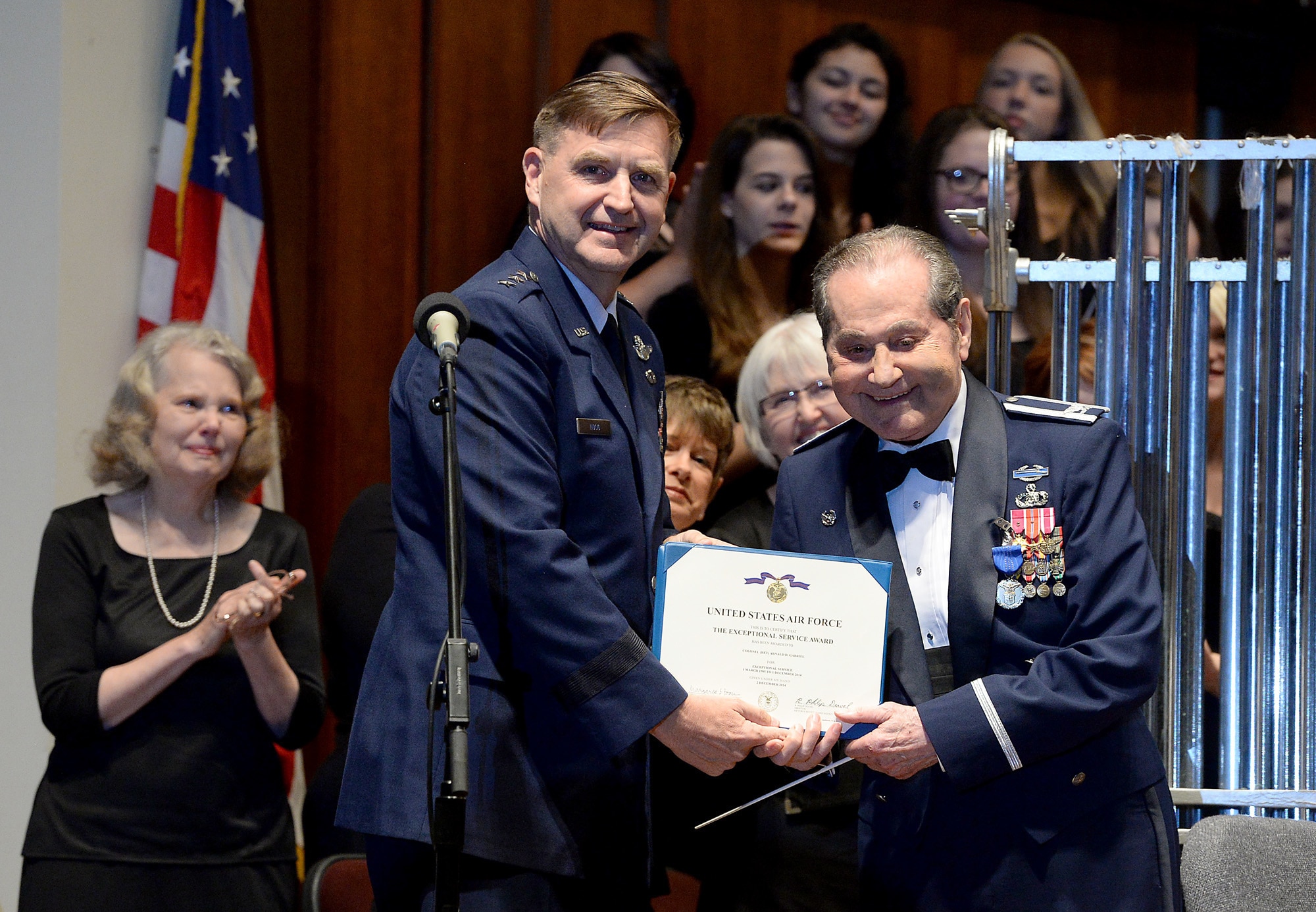 Assistant vice chief of staff of the Air Force Lt. Gen. Stephen L. Hoog  presents the Secretary of the Air Force Exceptional Service Award to retired Col. Arnald D. Gabriel for exemplary volunteer public service. (Scott M. Ash photo/released)