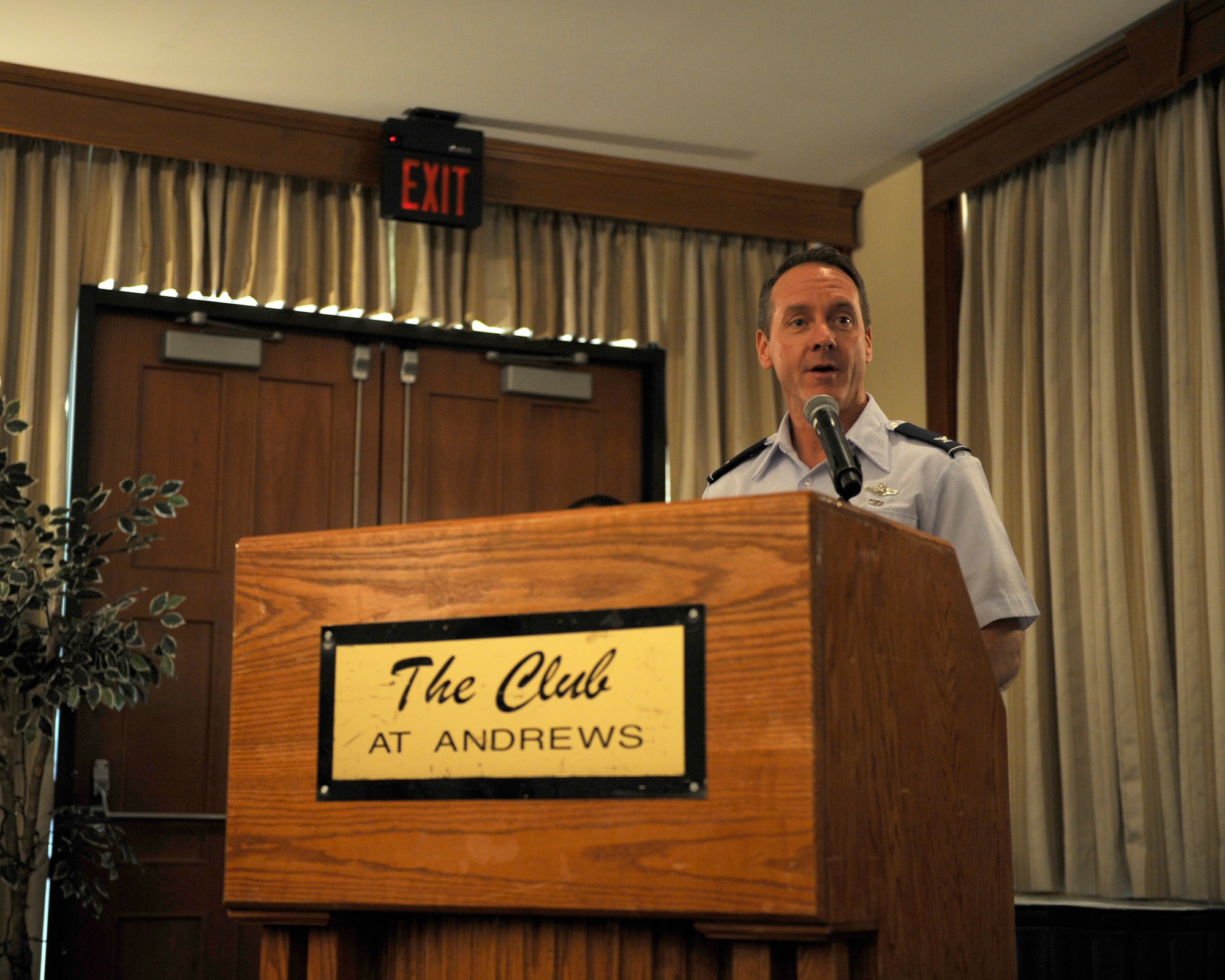 Col. Bradley Hoagland, 11th Wing commander, addresses attendees of the Joint Base Andrews 2015 Honorary Commander Luncheon Ceremony May 29, 2015, at The Club, JBA, Md. During the luncheon, each inductee was presented a certificate of induction and an honorary commander lapel pin. (U.S.  Air Force photo by Senior Airman Preston Webb/RELEASED)