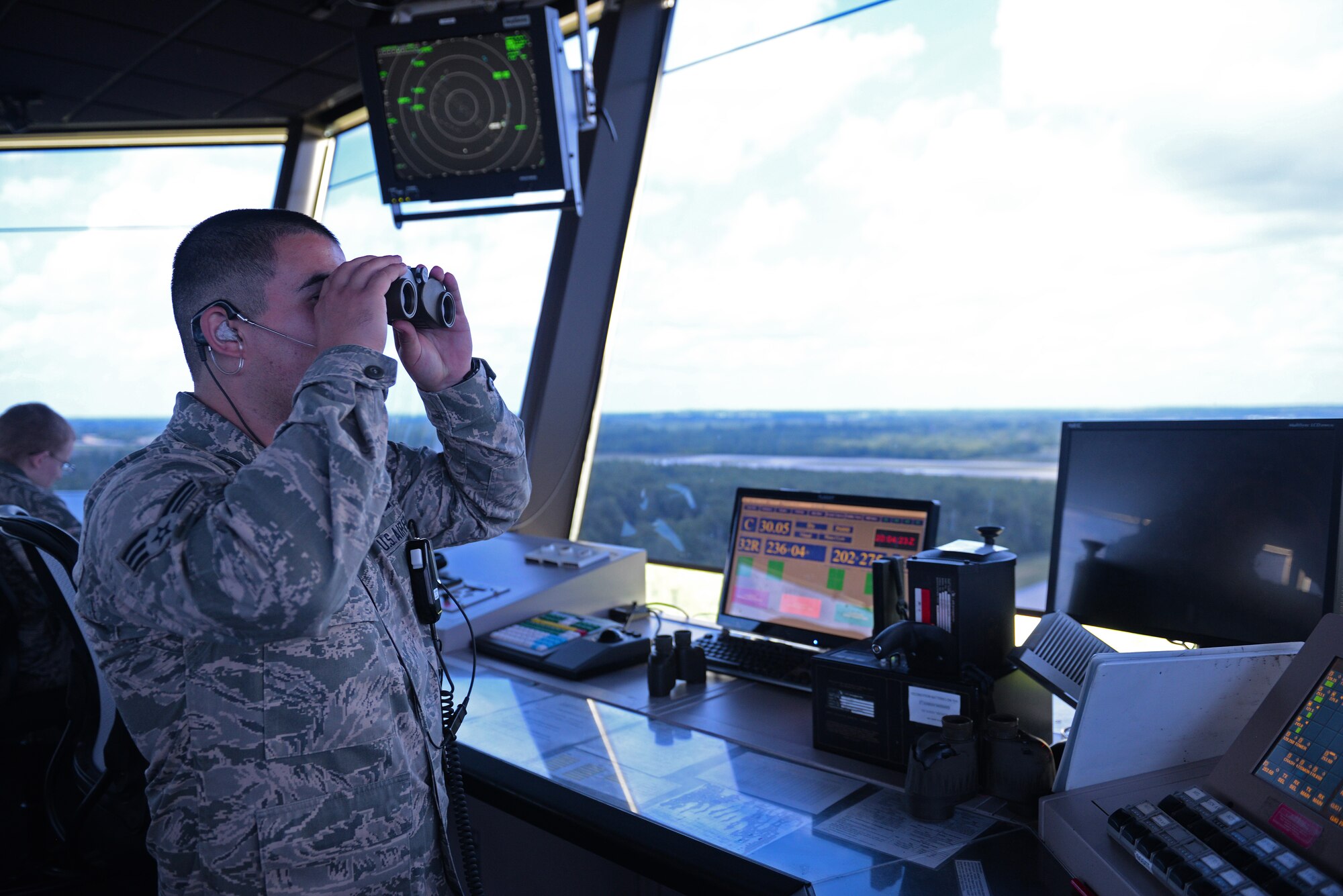 Senior Airman Joshua Rose, 375th Operations Support Squadron Air Traffic Controller, monitors flights within Scott Air Force Base, Illinois airspace, May 27, 2015. The Acushnet, Massachusetts native has been stationed at Scott for more than 2 years, and in his off duty time, he can found volunteering in the surrounding communities. (U.S. Air Force photo by Airman 1st Class Erica Crossen)