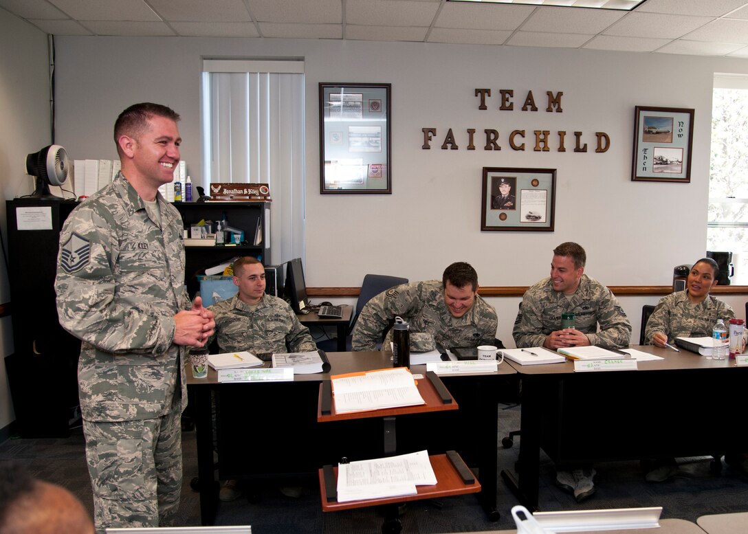 PETERSON AIR FORCE BASE, Colorado – Master Sgt. Jonathan Kiley, Vosler NCO Academy instructor, jokes with his students during class at the Vosler NCOA, May 27, 2015. In Kiley’s spare time he is a volunteer for the Colorado Springs Project Healing Waters. For approximately two years Kiley has been teaching members how to tie flies, and is also a program manager creating different levels of courses for non-experienced and experienced fly tiers. (Air Force photo by Senior Airman Tiffany DeNault)