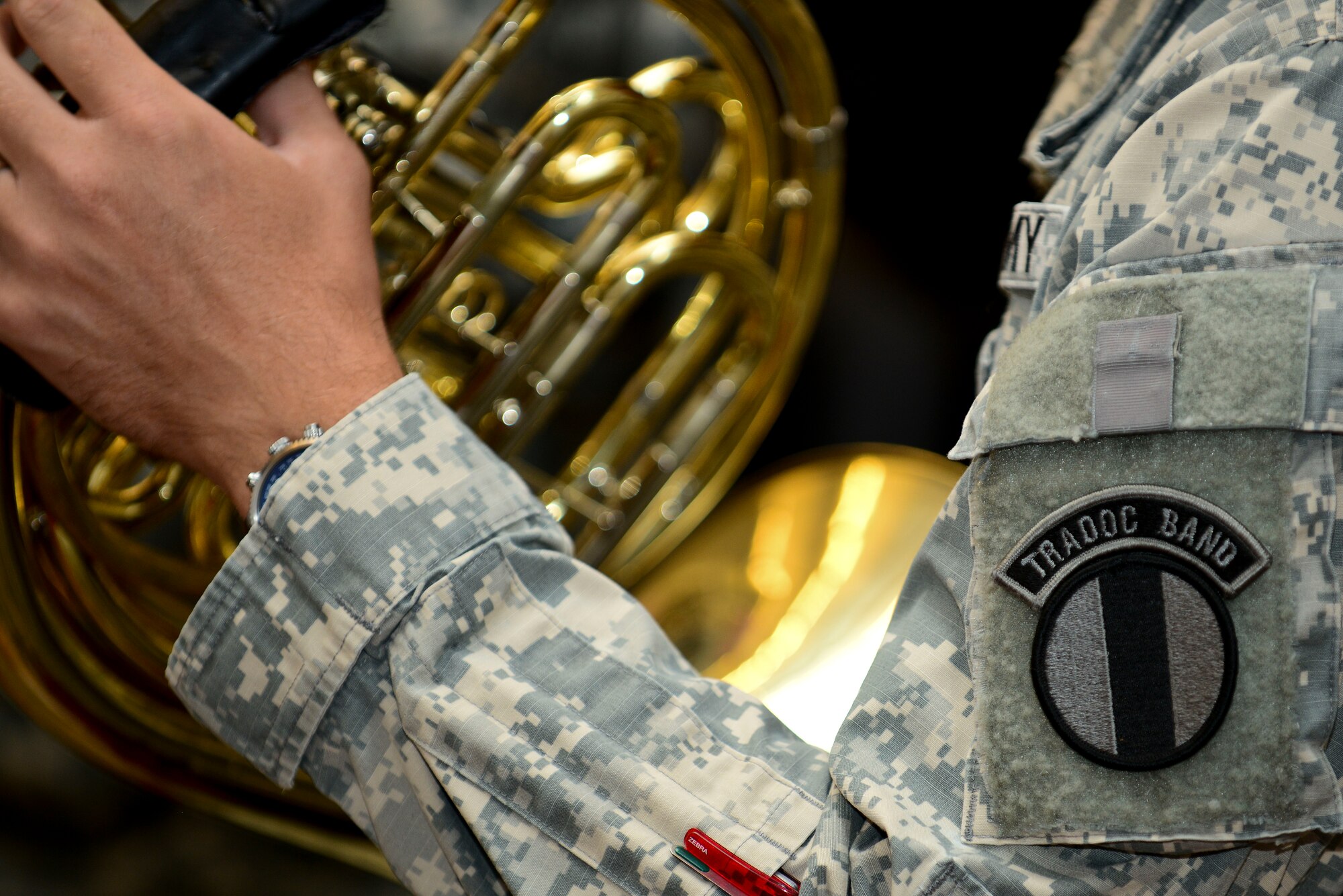 A U.S. Army Training Doctrine and Command Band concert band member participates in rehearsal at Fort Eustis, Va., June 1, 2015. The concert band is one of several assemblies of the TRADOC band that will perform during their summer concert series, “Music Under the Stars.”  (U.S. Air Force photo by Senior Airman Kimberly Nagle/Released)  