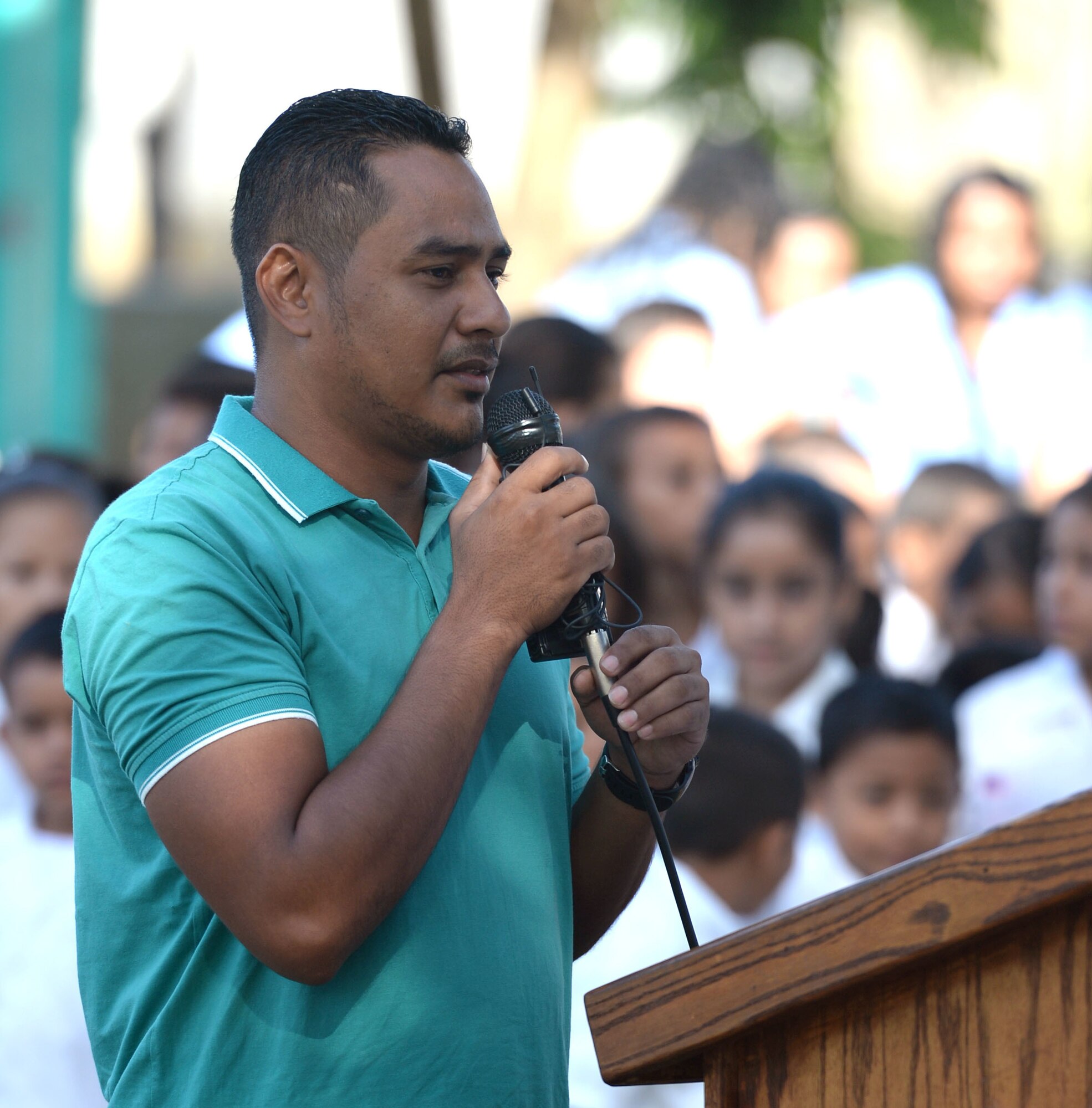 Abraham Ruiz, Gabriela Mistral principal, speaks during the groundbreaking ceremony at his school in Ocotoes Alto, Honduras, June 1, 2015. The event marked the first day of construction on the site and the first day of the New Horizons Honduras 2015 training exercise taking place in and around Trujillo and Tocoa Honduras. New Horizons was launched in the 1980s and is an annual joint humanitarian assistance exercise that U.S. Southern Command conducts with a partner nation in Central America, South America or the Caribbean. The exercise improves joint training readiness of U.S. and partner nation civil engineers, medical professionals and support personnel through humanitarian assistance activities. (U.S. Air Force photo by Capt. David J. Murphy/Released)