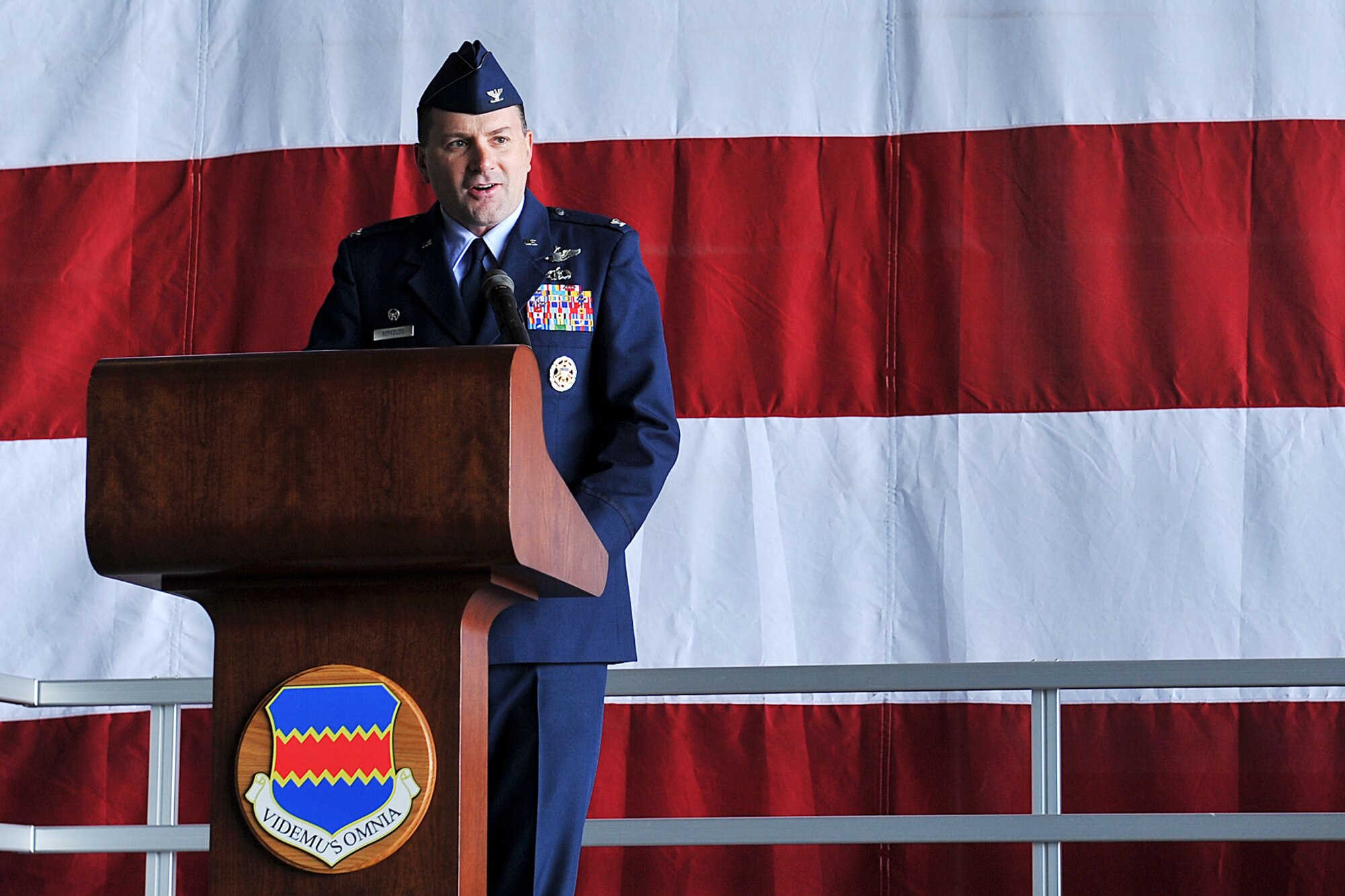 U.S. Air Force Col. Marty Reynolds, 55th Wing commander, gives his first speech to team Offutt members during the 55th Wing Change of Command inside Dock 1 of the Bennie Davis Maintenance Faculty on Offutt AFB, Neb. June 1. Reynolds is the former commander of the 55th Electronic Combat Group, 55th Wing, Davis-Monthan AFB, Arizona. (U.S. Air Force photo by Charles Haymond/Released)