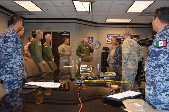 1st Air Force (Air Forces Northern) Staff members meet with Mexican Air Force LNOs during the Ardent Sentry 15 Exercise held at Tyndall Air Force Base, Fla.  The five Mexican’s representatives coordinated with the AFNORTH staff on emergency response efforts to an exercise earthquake scenario that featured a 7.8 magnitude quake striking Southern California and Northern Mexico. (U.S. Air Force Photo by Mary McHale/Released)