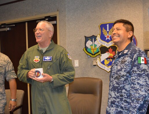 1st Air Force (Air Forces Northern) Commander, Lt. Gen. William H. Etter talks with Mexican Air Force LNO, Lt Col Ruben Cortes Hernandez during the Ardent Sentry 15 Exercise held at Tyndall Air Force Base, Fla.  Ardent Sentry 15 marked the first time that Mexican military personnel had participated in the exercise with American forces at Tyndall AFB. (U.S. Air Force Photo by Mary McHale/Released)