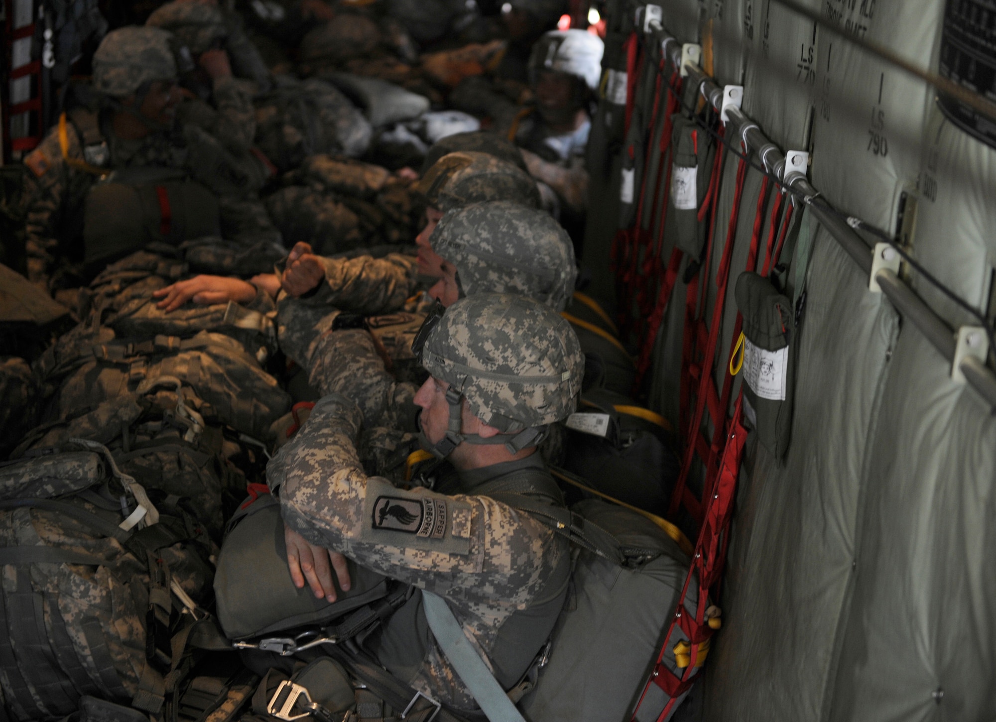 U.S. Army Soldiers from Headquarters and Headquarters Company 173rd Brigade Special Troops Battalion (Airborne) prepare for a 1,100ft. combat equipment jump during Exercise Noble Shirley 2015 May 12, 2015, over Israel.  Exercise Noble Shirley 2015 is a routine training exercise designed to promote cooperation and interoperability between U.S. Forces and Israel Defense Forces. (U.S. Air Force photo/Tech. Sgt. Patrick Mitchell)

