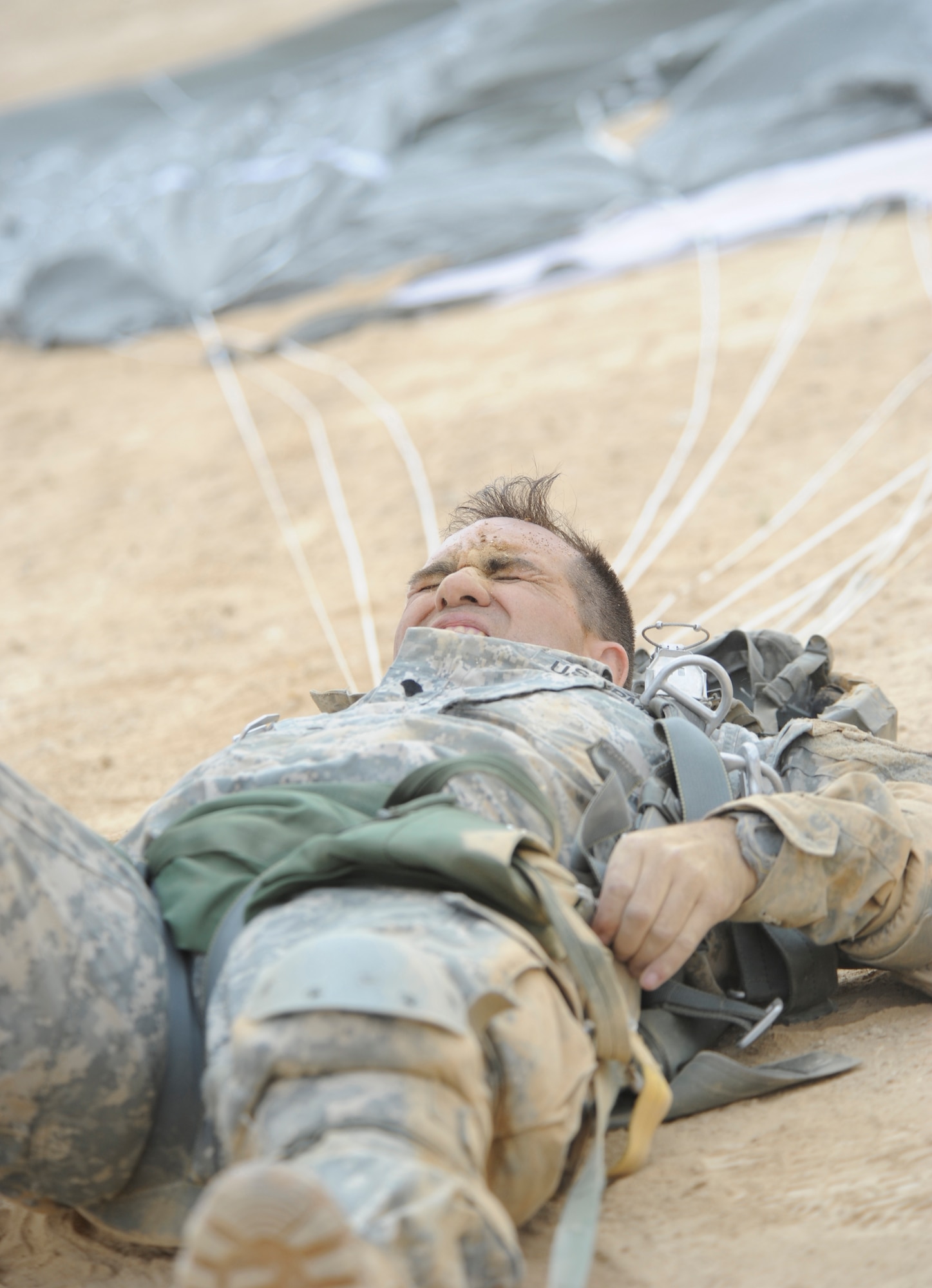 U.S. Army Specialist Christopher Jester, Headquarters and Headquarters Company 173rd Brigade Special Troops Battalion (Airborne) Combat Medic, completes a 1,100ft. combat equipment jump during Exercise Noble Shirley 2015, May 10, 2015.  With an Israeli jump master directing the jump, the HHC 173rd BSTB soldiers were able to earn Israeli jump wings - rare opportunity. (U.S. Air Force photo/Tech. Sgt. Patrick Mitchell)