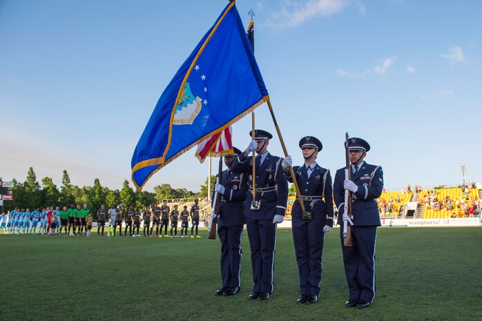 Joint Base Charleston Honor Guard posts the colors during the Charleston Battery soccer team's military appreciation night held at Blackbaud Stadium on Daniel Island, S.C., May, 30 2015. The team wore camouflage uniforms and provided free tickets to any service member, retiree or spouse who presented a military ID. Charleston Battery won the match 1-0(U.S. Air Force by Staff Sgt. William A. O’Brien)