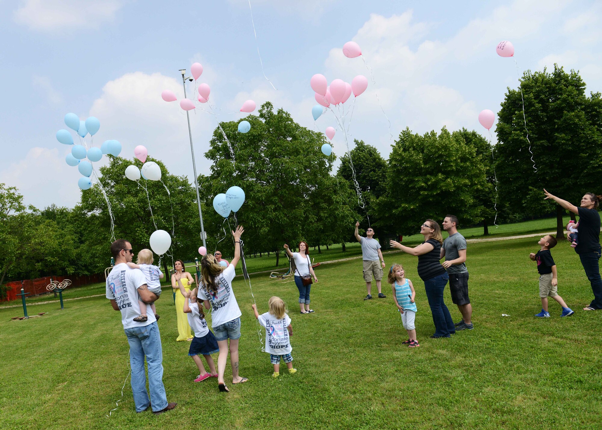 Team Aviano members release balloons during the Airborne Angels’ balloon release event, May 30, 2015, at the park in San Quirino, Italy, to honor the memories of infant or unborn children who have passed away. The local, non-profit organization aims to connect people who have experienced similar loss to help encourage others and continue healing. (U.S. Air Force photo by Airman 1st Class Deana Heitzman/Released)