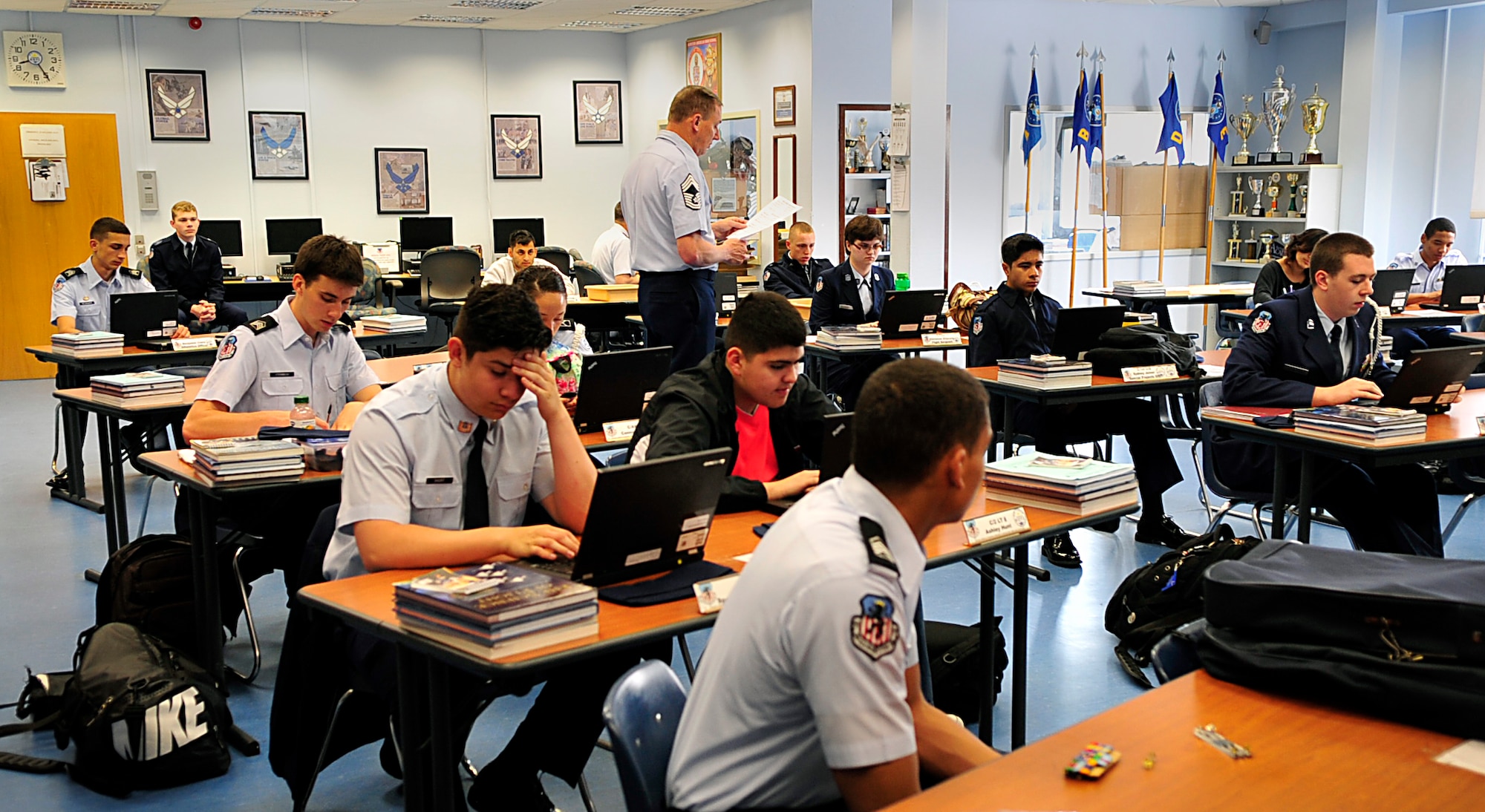 Retired Chief Master Sgt. Stephen Dilda, Ramstein High School Junior Reserve Officer Training Corps instructor, teaches a junior ROTC class May 7, 2015, at Ramstein Air Base, Germany. The Ramstein High School junior ROTC program scored the highest rating of “exceeds standards” during a recent inspection and was selected to receive the 2014-2015 Air Force junior ROTC Outstanding Organization Award. (U.S. Air Force photo/Airman 1st Class Larissa Greatwood)