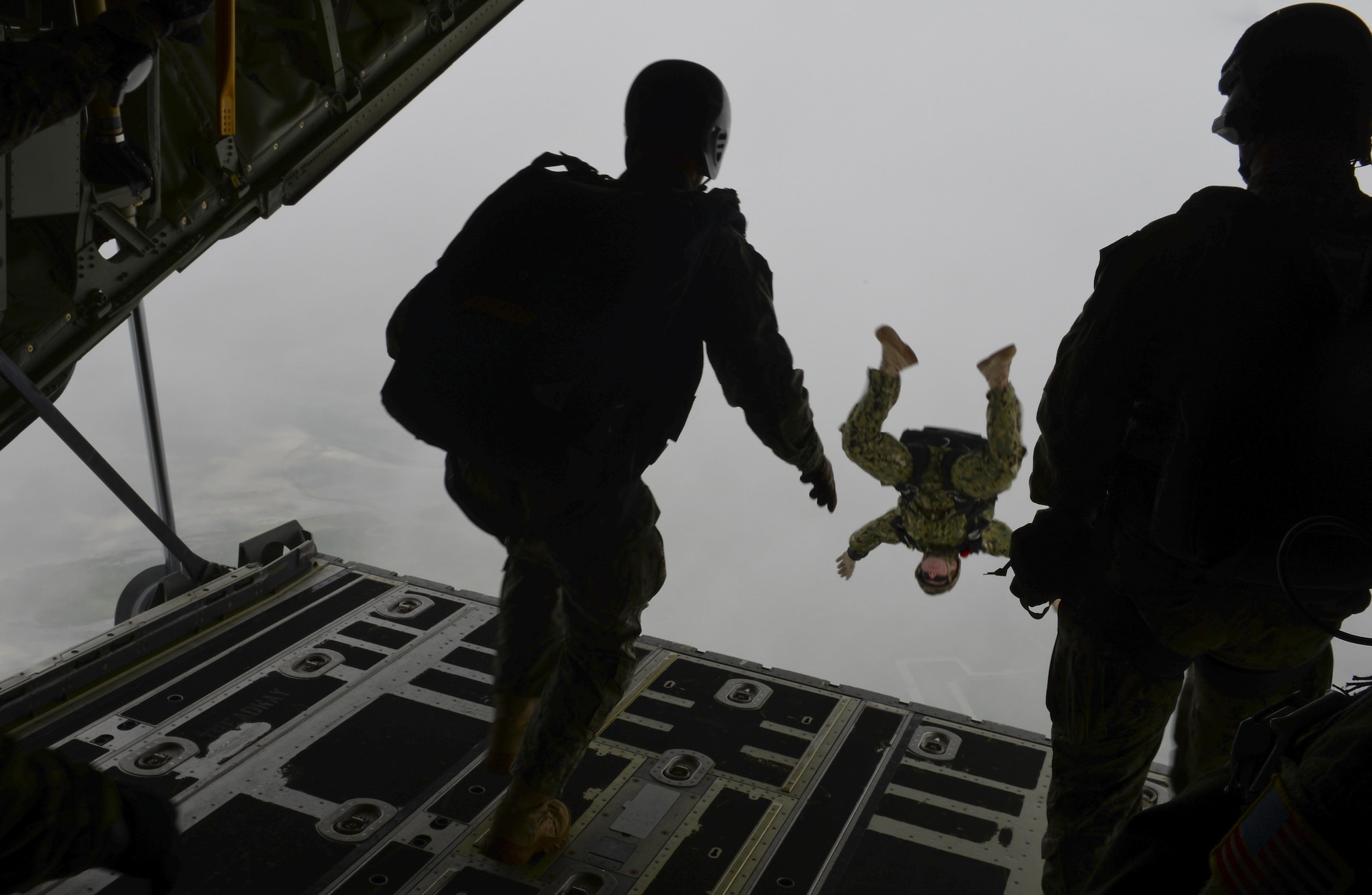 Operators from U.S. Special Operations Command -- Europe free fall during a high-altitude, low-opening jump May 30, 2015, over Mont Saint-Michele, France. The paratroopers jumped from an MC-130J Commando II assigned to the 67th Special Operations Squadron from as high as 13,000 feet to commemorate the 71st anniversary of the liberation of France during World War II. (U.S. Air Force photo by Staff Sgt. Micaiah Anthony)