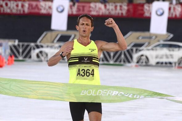 Major Benjamin Payne crosses the finish line first at 2015 Bolder Boulder 10K in Boulder, Colorado. A member of the Air Force World Class Athlete Program at U.S. Air Force Academy, Payne is preparing for the 2016 Olympic Trials in Los Angeles where he will compete for the chance to go to the 2016 Olympics in Rio de Janeiro. Payne finished Bolder Boulder with a runtime of 30 minutes, 41.25 seconds. (Courtesy photo)