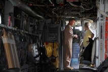 A Marine Corps pilot answers questions regarding the MV22 Osprey tiltrotor aircraft, which made stops at Owatonna, MN and Grand Forks, N.D., to showcase Marine Corps aviation technology and equimpment to the public, June 2. The Aircraft were flying from Marine Corps Air Station New River, N.C., to Marine Corps Air Station Yuma, AZ.