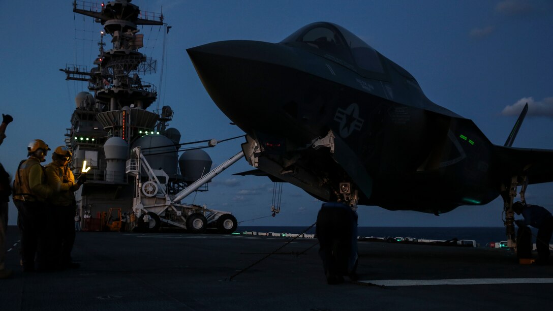 Maintenance is performed on an F-35B Lightning II on the flight deck of USS Wasp during night operations, a key component of the Marine Corps’ F-35B operational test May 22. OT-1, scheduled from May 18 through May 29, 2015, is evaluating the full spectrum of the F-35B’s capabilities. The F-35B is with Marine Fighter Attack Squadron 121, Marine Aircraft Group 13, 3rd Marine Aircraft Wing, based in Yuma, Arizona.