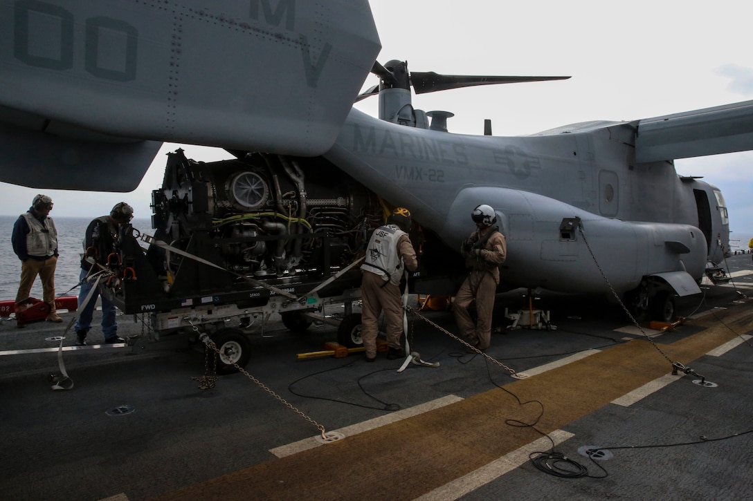 A power module for the F-35B Lightning II is moved out of an MV-22B Osprey and onto the USS Wasp, at sea May 22 during an evolution part of Operational Testing 1. OT-1 is serving the purpose of evaluating the full spectrum of F-35B measures of suitability and effectiveness, as well as assessing the integration of the aircraft into the spectrum of flight operations.