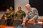 Legal advisers with the Republic of Colombia armed forces are joined by South Carolina National Guard JAG members in Columbia, South Carolina, May 18-22, 2015, as part of the National Guard’s State Partnership Program. 