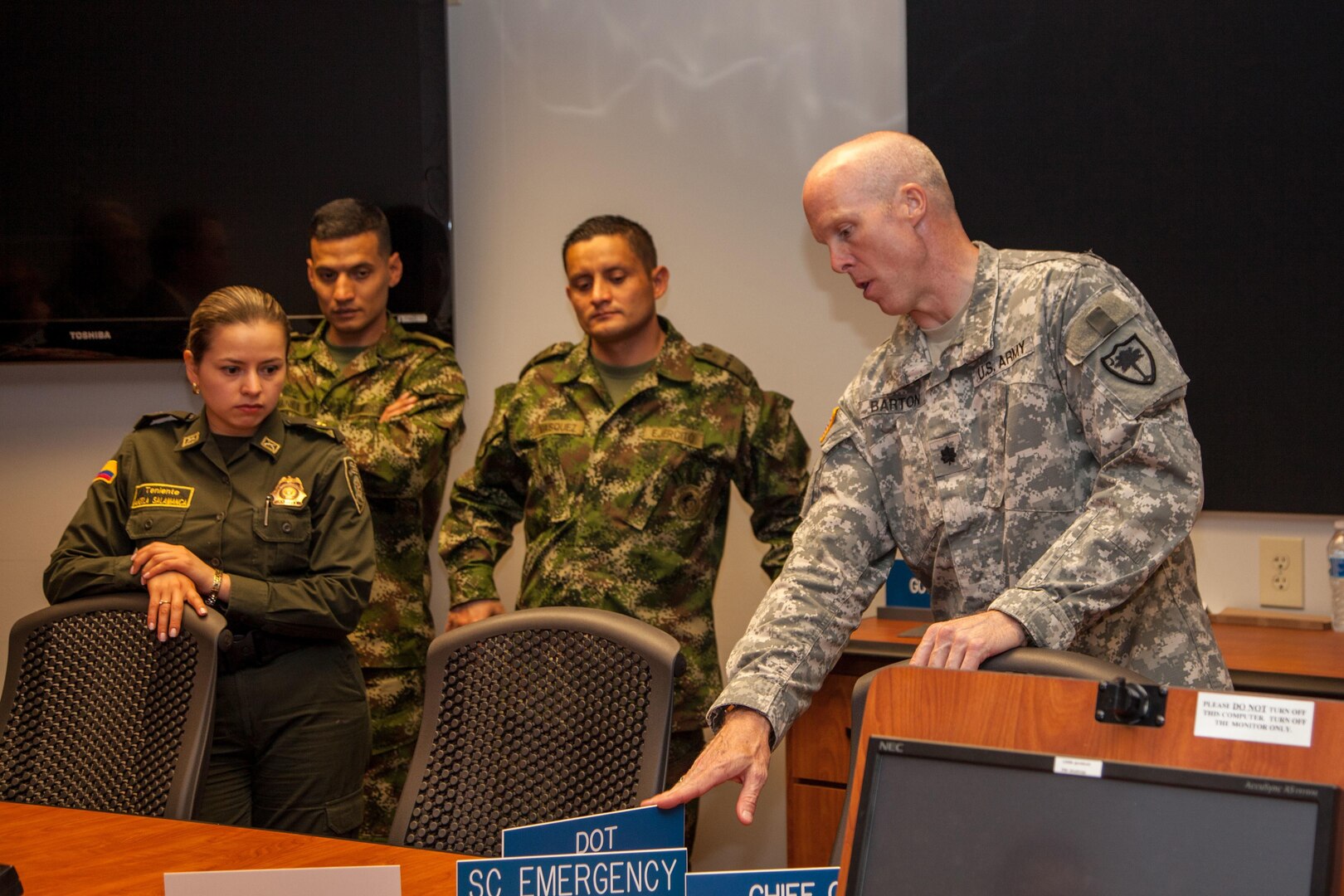 Legal advisers with the Republic of Colombia armed forces are joined by South Carolina National Guard JAG members in Columbia, South Carolina, May 18-22, 2015, as part of the National Guard’s State Partnership Program. 