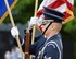 A U.S. Air Force Honor Guardsman presents the colors during the opening ceremonies of the inaugural performance of the 2015 U.S. Air Force Band Summer Concert Series at the Air Force Memorial in Arlington, Va., May 29, 2015.  (U.S. Air Force photo/Andy Morataya)