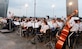 Col. Larry Lang, commander of the United States Air Force Band, conducts the inaugural performance of the 2015 U.S. Air Force Band Summer Concert Series at the Air Force Memorial in Arlington, Va., May 29, 2015. (U.S. Air Force photo/Andy Morataya)