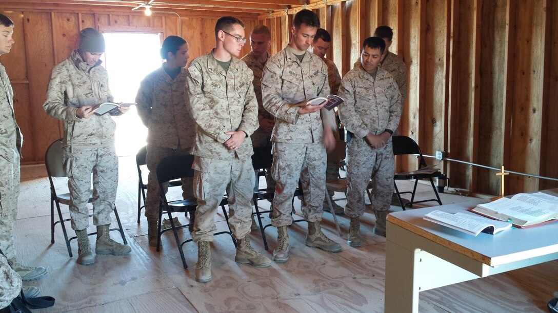 LFT to RT: LCpl Brownlee, LT Danielle Anderson, 2nd Lt Tiffany Aguiar, LCpl Hurla, 1st Lt A.J. Gerdes, LCPL Brady, CAPT David Huewetter, 1st Lt Heriberto Lopez,  LCpl Nick Rosen 
The Congregants preparing their hearts and minds for Communion.
