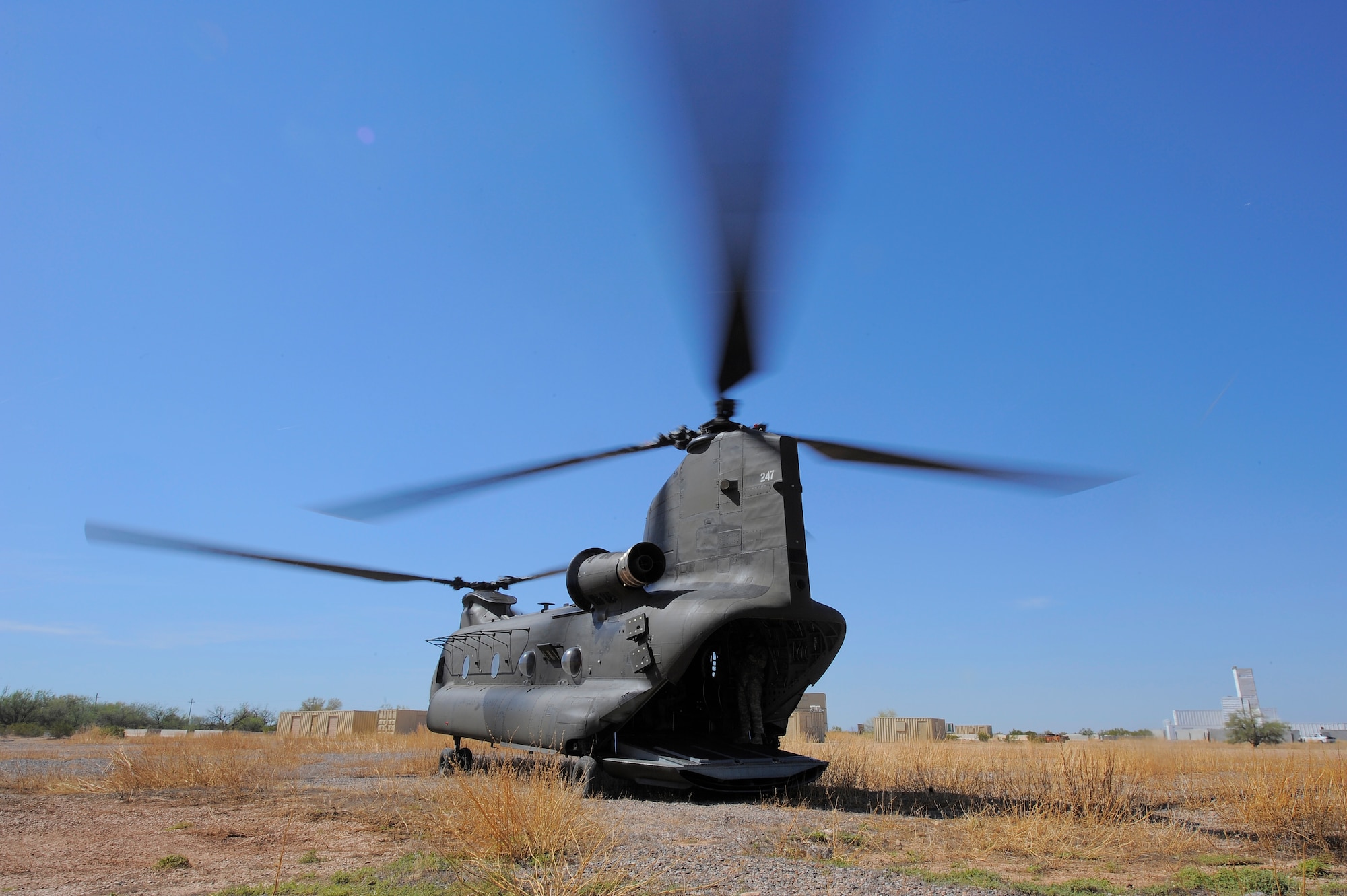 A U.S. Army CH-47D Chinook from the Montana Army National Guard’s 1-189th General Support Aviation Battalion, prepares to take off from Ruby Fuzzy MOA, Ariz., during Angel Thunder 2015, June 2, 2015. Angel Thunder is the world’s largest personnel recovery exercise, hosting 11 partner nations and nine inter-agencies at Davis-Monthan Air Force Base. (U.S. Air Force photo by Staff Sgt. Angela Ruiz/Released)