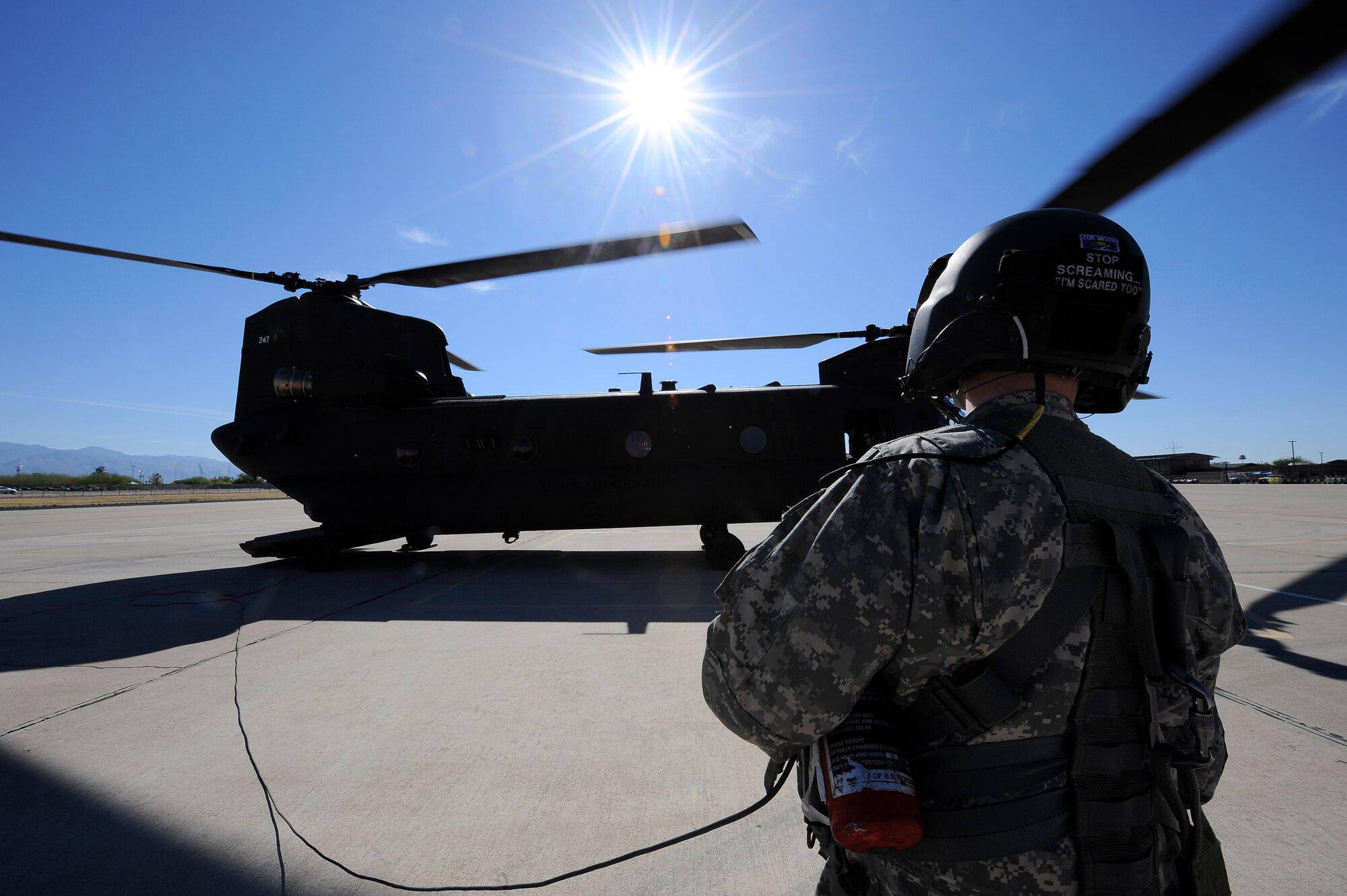 U.S. Army Staff Sgt. Westly Vincent, Task Force Tatanka, CH-47D Chinook flight engineer, conducts start up procedures on a CH-47D prior to take off during Angel Thunder 2015 at Davis-Monthan Air Force Base, Ariz., June 2, 2015. Task Force Tatanka is made up of three companies from the Montana Army National Guard’s 1-189th General Support Aviation Battalion. (U.S. Air Force photo by Staff Sgt. Angela Ruiz/Released)