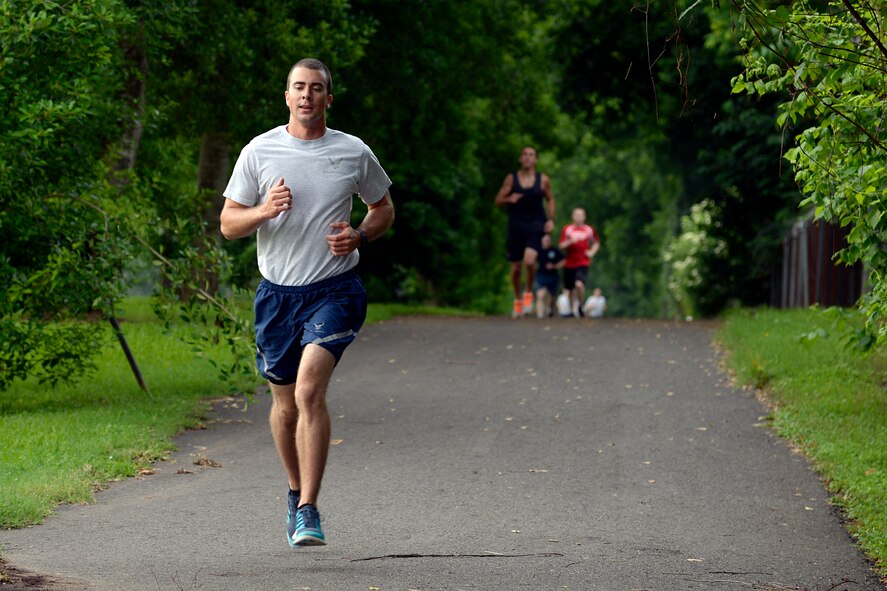 Members of Team Barksdale participate in a 5K fun run, marking the beginning of Sports Day at Barksdale Air Force Base, Louisiana, May 29, 2015. Airmen participated in various team-sporting events ranging from basketball to bowling. (U.S. Air Force photo/Tech. Sgt. Marie Brown)
