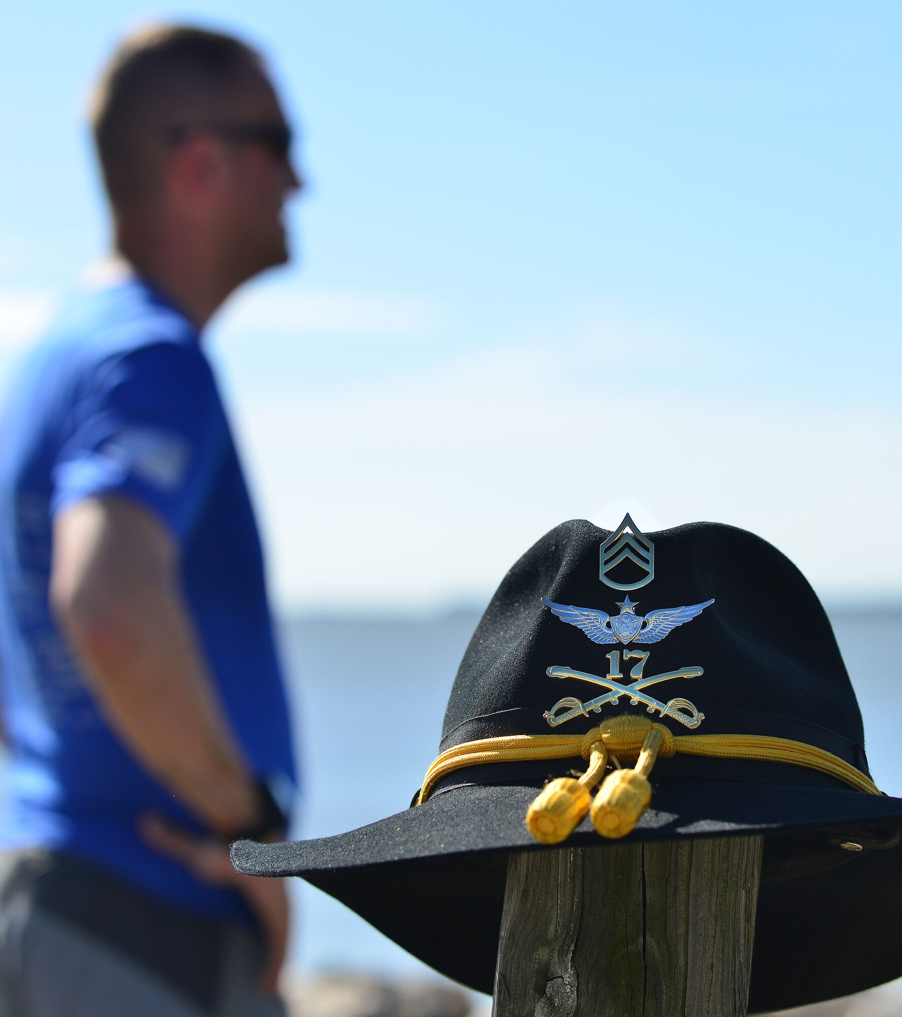 U.S. Army Staff Sgt. Jeffery Lewis, Charlie Company, 1st Battalion, 222nd Aviation Regiment platoon sergeant, rests after his run at Fort Eustis, Va., May 12, 2015. Lewis runs five to six days a week in preparation for marathons he runs in honor of fallen Service members and their families. (U.S. Air Force photo by Staff Sgt. Natasha Stannard/Released) 