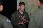 Lt. Col. Dan Roberts, 359th Aerospace and Operational Physiology Training Flight commander, speaks to a group of flight surgeons from the Indian navy, Republic of Korea air force and the Pakistani air force May 20 at Joint Base San Antonio-Randolph. (U.S. Air Force photo by Airman 1st Class Stormy Archer)