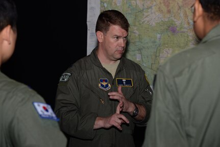 Lt. Col. Dan Roberts, 359th Aerospace and Operational Physiology Training Flight commander, speaks to a group of flight surgeons from the Indian navy, Republic of Korea air force and the Pakistani air force May 20 at Joint Base San Antonio-Randolph. (U.S. Air Force photo by Airman 1st Class Stormy Archer)