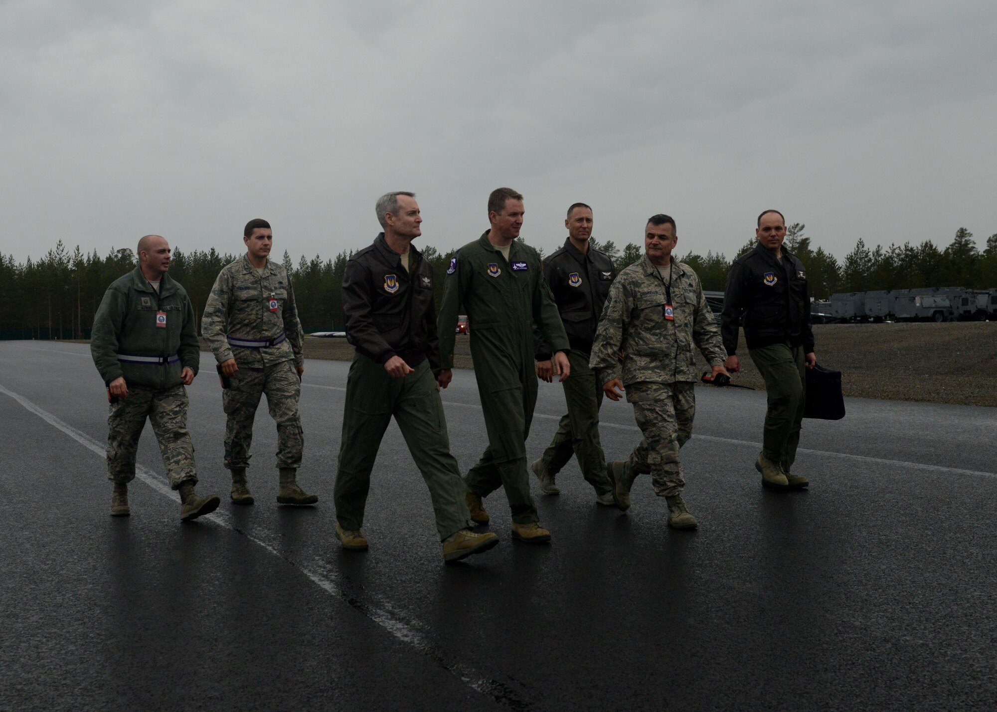 Lt. Gen. Darryl Roberson, 3rd Air Force and 17th Expeditionary Air Force commander, walks with 510th Fighter Squadron leadership and his staff during a visit at Kallax Air Base, Sweden June 1, 2015.  Roberson thanked Airmen for their hard work during Arctic Challenge Exercise 2015.  During his visit, Roberson was briefed on the exercise, visited Airmen and observed mission takeoffs. (U.S. Air Force photo by Staff Sgt. Evelyn Chavez)  
