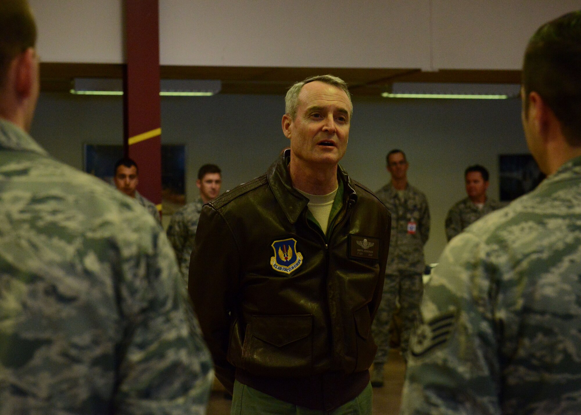 Lt. Gen. Darryl Roberson, 3rd Air Force and 17th Expeditionary Air Force commander, speaks with 31st Fighter Wing Airmen at Kallax Air Base, Sweden June 1, 2015.  Roberson thanked Airmen for their hard work during Arctic Challenge Exercise 2015.  During his visit, Roberson was briefed on the exercise, visited Airmen and observed mission takeoffs. (U.S. Air Force photo by Staff Sgt. Evelyn Chavez)
