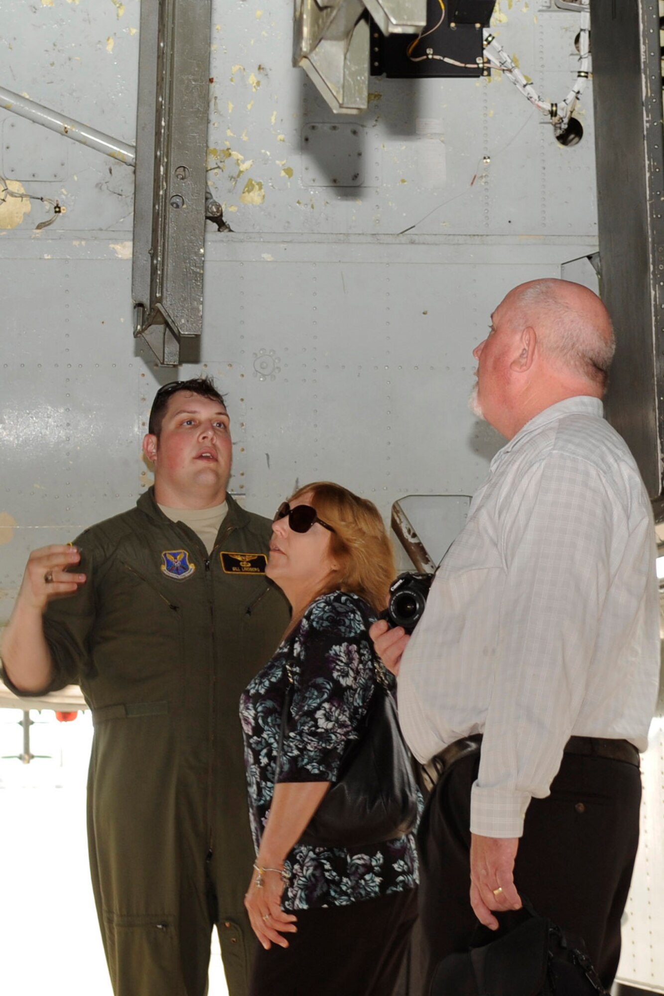 U.S. Air Force Capt. Bill Lindberg of graduating FTU Class 14-03 at Barksdale Air Force Base, La, gives his parents a tour of the bomb bay of a B-52 Stratofortress after his graduation on May 29, 2015. Lindberg also took them up to the flight deck so they could see where he works. (U.S. Air Force photo by Master Sgt. Laura Siebert /Released)