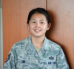 Staff Sgt. Phuong Lim, 607th Air Operations Center collection manager, poses for a photo June 2, 2015, at Osan Air Base Republic of Korea. Lim was chosen as a Team Osan Spotlight award winner. Individuals who are chosen for this spotlight recognition are distinguished as consistent, superior performers within their squadrons.