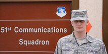 Senior Airman Corey Payne, 51st Communcations Squadron network administrator, poses for a photo June 1, 2015, at Osan Air Base Republic of Korea. Payne was chosen as a Team Osan Spotlight award winner. Individuals who are chosen for this spotlight recognition are distinguished as consistent, superior performers within their squadrons.