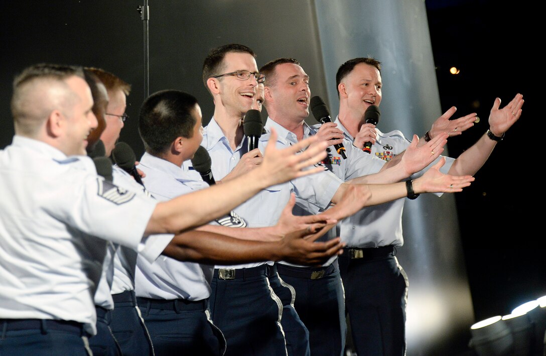 The Air Force Singing Sergeants harmonize for the audience during the inaugural performance of the 2015 U.S. Air Force Band Summer Concert Series at the Air Force Memorial in Arlington, Va., May 29, 2015. (U.S. Air Force photo/Andy Morataya)