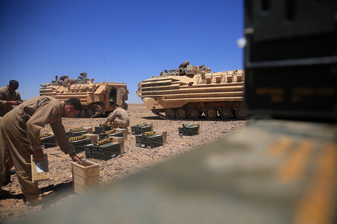 150506-M-WA276-065: JORDAN (May 6, 2015) Marines with Kilo Company, Battalion Landing Team 3rd Battalion, 6th Marine Regiment, 24th Marine Expeditionary Unit, prepare ammunition for a live-fire exercise as part of Exercise Eager Lion 2015 in Jordan, May 6, 2015. Eager Lion is a recurring multinational exercise designed to strengthen military-to-military relationships, between partner nations and enhance regional security and stability. The 24th MEU is embarked on the ships of the Iwo Jima Amphibious Ready Group and deployed to maintain regional security in the U.S. 5th Fleet area of operations. (U.S. Marine Corps photo by Lance Cpl. Dani A. Zunun/Released)