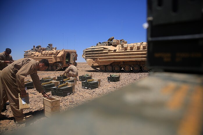 150506-M-WA276-065: JORDAN (May 6, 2015) Marines with Kilo Company, Battalion Landing Team 3rd Battalion, 6th Marine Regiment, 24th Marine Expeditionary Unit, prepare ammunition for a live-fire exercise as part of Exercise Eager Lion 2015 in Jordan, May 6, 2015. Eager Lion is a recurring multinational exercise designed to strengthen military-to-military relationships, between partner nations and enhance regional security and stability. The 24th MEU is embarked on the ships of the Iwo Jima Amphibious Ready Group and deployed to maintain regional security in the U.S. 5th Fleet area of operations. (U.S. Marine Corps photo by Lance Cpl. Dani A. Zunun/Released)
