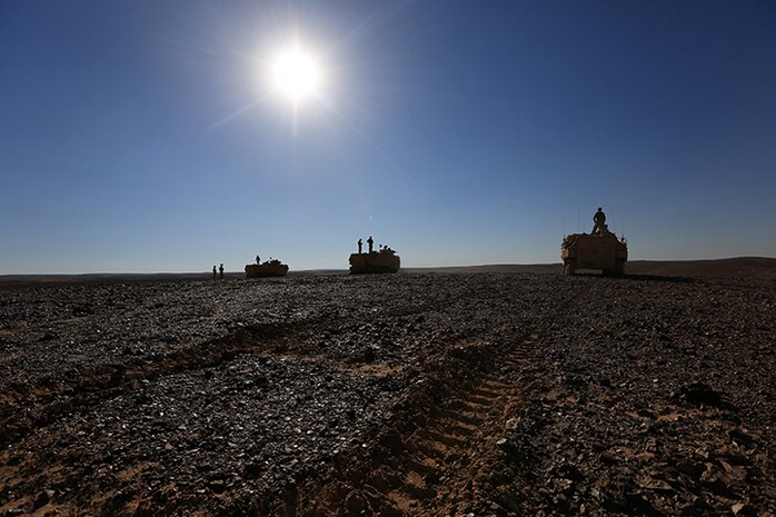 150506-M-WA276-136: JORDAN (May 6, 2015) Assault Amphibious Vehicles with Kilo Company, Battalion Landing Team 3rd Battalion, 6th Marine Regiment, 24th Marine Expeditionary Unit, stage vehicles during a live-fire exercise as part of Exercise Eager Lion 2015 in Jordan, May 6, 2015. Eager Lion is a recurring multinational exercise designed to strengthen military-to-military relationships, between partner nations and enhance regional security and stability. The 24th MEU is embarked on the ships of the Iwo Jima Amphibious Ready Group and deployed to maintain regional security in the U.S. 5th Fleet area of operations. (U.S. Marine Corps photo by Lance Cpl. Dani A. Zunun/Released)