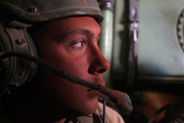Lance Cpl. Robert A. Selkirk, an Assault Amphibian Crewmen with Kilo Company, Battalion Landing Team 3rd Battalion, 6th Marine Regiment, 24th Marine Expeditionary Unit, takes part in a simulated platoon assault during Exercise Eager Lion 2015 in Jordan, May 9, 2015. Eager Lion is a recurring multinational exercise designed to strengthen military-to-military relationships, increase interoperability between partner nations, and enhance regional security and stability. The 24th MEU is embarked on the ships of the Iwo Jima Amphibious Ready Group and deployed to maintain regional security in the U.S. 5th Fleet area of operations. (U.S. Marine Corps photo by Lance Cpl. Austin A. Lewis/Released)