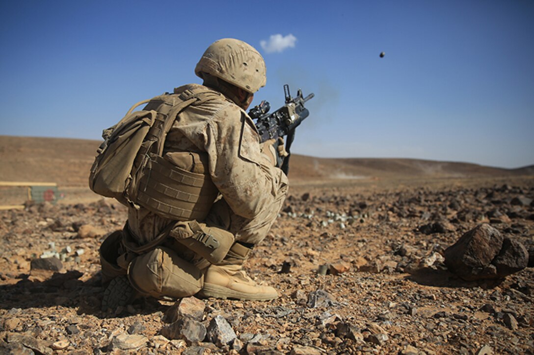 1505014-M-WA276-411: JORDAN (May 14, 2015) Cpl. Miguel Ordonez, a squad leader with Kilo Company, Battalion Landing Team 3rd Battalion, 6th Marine Regiment, 24th Marine Expeditionary Unit, fires an M203 Grenade Launcher during a live-fire exercise, as part of Exercise Eager Lion 2015, in Jordan, May 14, 2015. Eager Lion is a recurring multinational exercise designed to strengthen military-to-military relationships, between partner nations and enhance regional security and stability. The 24th MEU is embarked on the ships of the Iwo Jima Amphibious Ready Group and deployed to maintain regional security in the U.S. 5th Fleet area of operations. (U.S. Marine Corps photo by Lance Cpl. Dani A. Zunun)